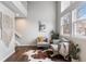 Bright living room with high ceilings, large windows, and comfortable seating area at 6450 W 44Th Pl # B3, Wheat Ridge, CO 80033