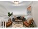 Comfortable loft area features stylish seating, an area rug, and a relaxing atmosphere at 6450 W 44Th Pl # B3, Wheat Ridge, CO 80033
