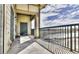A spacious balcony with calming views. Features a secure railing, storage, and ample natural light at 3872 S Dallas St # 7-307, Aurora, CO 80014