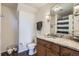 Charming bathroom with a granite vanity, ample lighting, and a shower-tub combination at 3872 S Dallas St # 7-307, Aurora, CO 80014