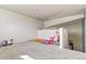 Versatile bonus room provides a flexible space for play, work, or relaxation at 3872 S Dallas St # 7-307, Aurora, CO 80014