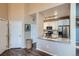 Modern kitchen featuring granite countertops, stainless steel appliances, and ample cabinet space at 3872 S Dallas St # 7-307, Aurora, CO 80014