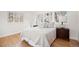 Light and bright bedroom with hardwood floors, neutral paint, and many windows for natural sunlight at 1960 Hudson St, Denver, CO 80220