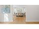 Dining area showcases hardwood floors, modern lighting, and natural light at 1960 Hudson St, Denver, CO 80220