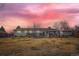 Enjoy the spacious backyard of this home, which features a deck, a gazebo, and a storage shed at 15756 E Temple Pl, Aurora, CO 80015