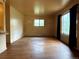 Spacious living room featuring hardwood floors and plenty of natural light at 1890 Eaton St, Lakewood, CO 80214