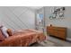 Stylish bedroom features a decorative wall, a cozy bed, and modern furnishings at 20272 Terrace View Dr, Parker, CO 80134