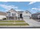 Inviting single-Gathering home with neutral siding, a well-maintained lawn, and an attached two-car garage at 20272 Terrace View Dr, Parker, CO 80134