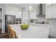 Bright kitchen offers a large island, stainless appliances, double oven, and an open floor plan at 20272 Terrace View Dr, Parker, CO 80134
