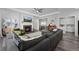 Spacious living room with a fireplace, hardwood floors, and an open layout for entertaining guests at 20272 Terrace View Dr, Parker, CO 80134
