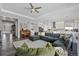 Spacious open-concept living area featuring hardwood floors and seamless access to the kitchen at 20272 Terrace View Dr, Parker, CO 80134