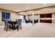 Finished basement with recreation area and wet bar at 370 S Glencoe St, Denver, CO 80246