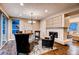 Cozy living room featuring a fireplace and hardwood floors at 370 S Glencoe St, Denver, CO 80246
