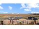 Aerial view of the apartment complex with a scenic view of the surrounding landscape at 13456 Via Varra # 428, Broomfield, CO 80020