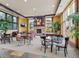 Community common area with seating, tables, fireplace, and pool table at 13456 Via Varra # 428, Broomfield, CO 80020
