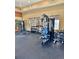 Community gym with weight machines, free weights, and ample workout space at 13456 Via Varra # 428, Broomfield, CO 80020
