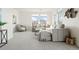 Comfortable living room featuring plush seating, modern decor, and natural light at 13456 Via Varra # 428, Broomfield, CO 80020