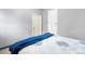 Bedroom with light gray walls, carpet flooring, and modern furniture at 14595 Robins Dr, Denver, CO 80239