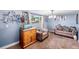 Cozy living room featuring plush seating, natural light, and stylish decor accents at 14595 Robins Dr, Denver, CO 80239