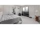 Bright, airy bedroom with two windows, neutral carpet, and comfortably styled for relaxation at 515 Bridger Ave, Fort Lupton, CO 80621