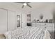 Bright bedroom featuring white walls, a large closet and a whitewashed dresser at 515 Bridger Ave, Fort Lupton, CO 80621