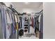 Organized walk-in closet with shelving and rods for ample storage space at 515 Bridger Ave, Fort Lupton, CO 80621