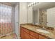 Renovated bathroom features new vanity and shower; stylish and functional at 17332 E Lake Ln, Aurora, CO 80016