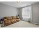 Cozy bedroom with neutral walls and plush carpeting, creating a relaxing atmosphere at 17332 E Lake Ln, Aurora, CO 80016