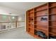 Upstairs hallway with built-in bookshelves; perfect for displaying your favorite books and decor at 17332 E Lake Ln, Aurora, CO 80016