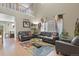 Bright and airy living room with a view of the kitchen area at 17332 E Lake Ln, Aurora, CO 80016