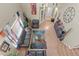 Spacious living room with hardwood floors and high ceilings, perfect for entertaining guests at 17332 E Lake Ln, Aurora, CO 80016