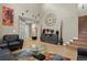 Spacious living room featuring a high ceiling and stylish accents at 17332 E Lake Ln, Aurora, CO 80016