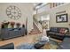 Open living area with a grand staircase and stylish decor at 17332 E Lake Ln, Aurora, CO 80016