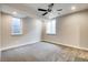 Bright bedroom with plush carpet and recessed lighting at 2473 S Cherokee St, Denver, CO 80223