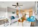 Open-concept living space featuring modern furnishings and seamless flow to the kitchen and dining areas at 2473 S Cherokee St, Denver, CO 80223