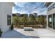 Backyard featuring a gas fire pit, wooden fence and mountain view homes at 7125 Skygazer St, Castle Pines, CO 80108