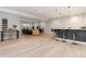 Finished basement with a bar, sitting area, and entertainment space at 7125 Skygazer St, Castle Pines, CO 80108