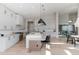 Bright, modern kitchen with an island, stainless steel appliances, and ample counter space at 7125 Skygazer St, Castle Pines, CO 80108