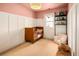 Cozy Bedroom with a soft color palette, board and batten walls, and a wooden crib at 1452 S Logan St, Denver, CO 80210