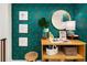 Inviting hallway with jaguar print wallpaper, decorative mirror and lamp, and stylish decor at 1452 S Logan St, Denver, CO 80210