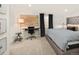 Bright bedroom with a comfortable bed, desk space, and a decorative wall map at 1452 S Logan St, Denver, CO 80210