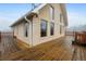 Charming home with a rustic deck, perfect for enjoying outdoor living and views at 31551 Black Widow Dr, Conifer, CO 80433