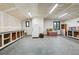 Large garage area with built-in shelving and abundant storage, offering versatility for various needs at 31551 Black Widow Dr, Conifer, CO 80433