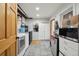 Functional laundry room with washer, dryer, and storage, providing ample space for chores at 31551 Black Widow Dr, Conifer, CO 80433