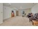 Spacious basement with carpet, seating area, shelving, and a bright window at 2868 Breezy Ln, Castle Rock, CO 80109