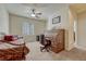 Cozy bedroom featuring a daybed and an antique desk area, perfect for relaxation and focused work at 2868 Breezy Ln, Castle Rock, CO 80109