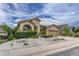Attractive home exterior featuring a well-manicured lawn and unique desert landscaping with charming curb appeal at 2868 Breezy Ln, Castle Rock, CO 80109