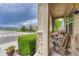 Cozy front porch with comfortable seating and scenic neighborhood views at 2868 Breezy Ln, Castle Rock, CO 80109