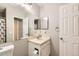 Clean bathroom with single sink vanity and shower/tub combo at 1475 S Quebec Way # H38, Denver, CO 80231