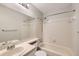 Clean bathroom with tub, shower, and updated vanity at 1475 S Quebec Way # H38, Denver, CO 80231